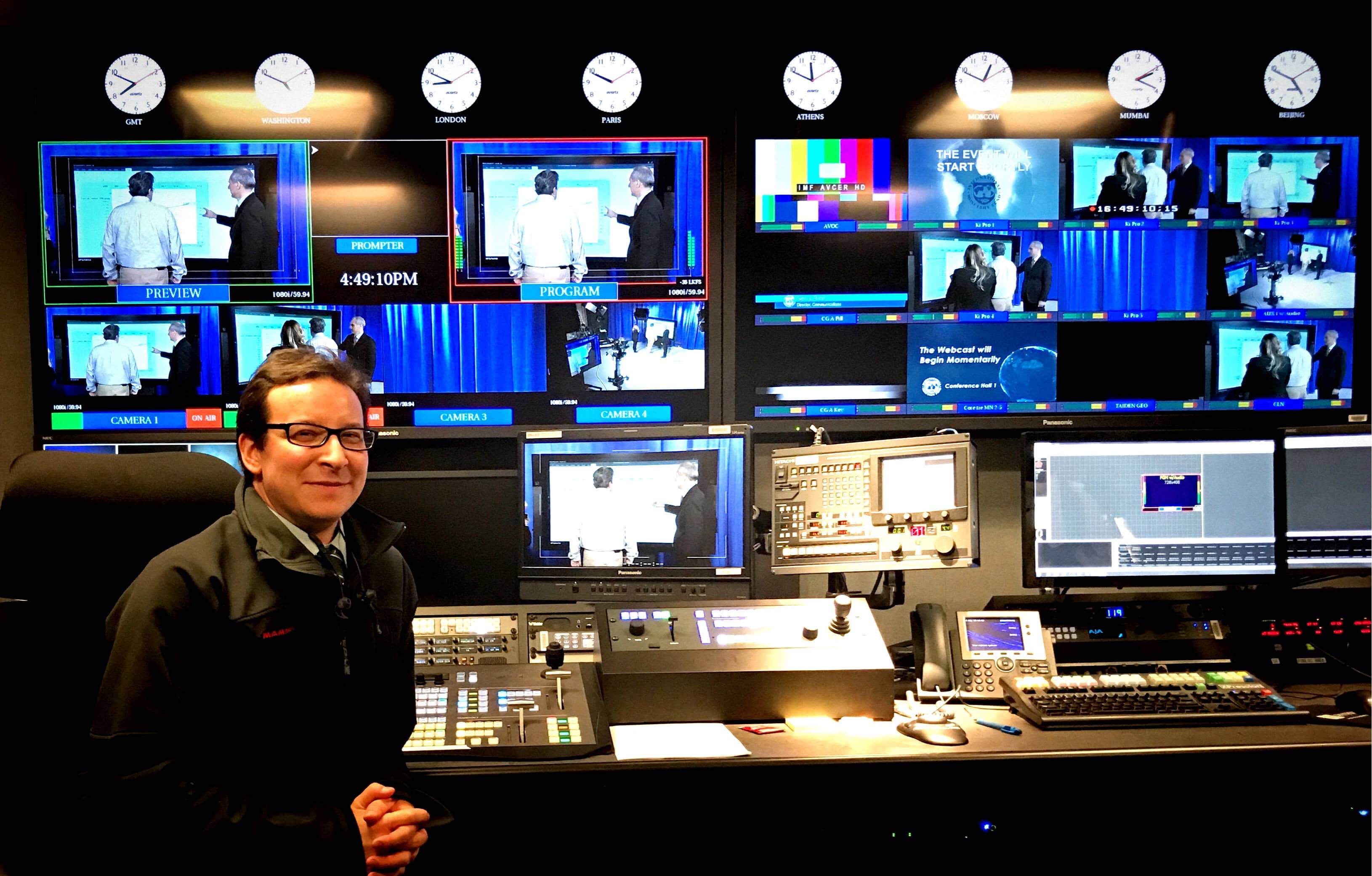 Jason sitting in front of the studio control panel